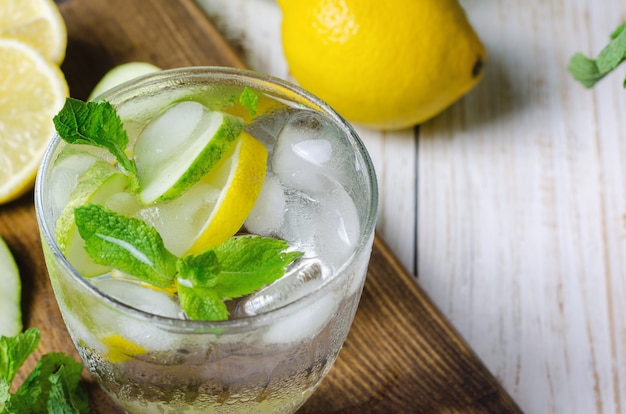 Cold lemonade with lemon, mint and cucumber.