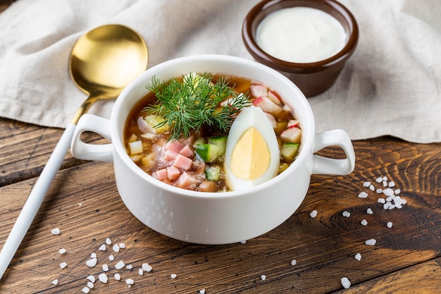 Cold okroshka soup Russian okroshka made of summer chopped vegetables