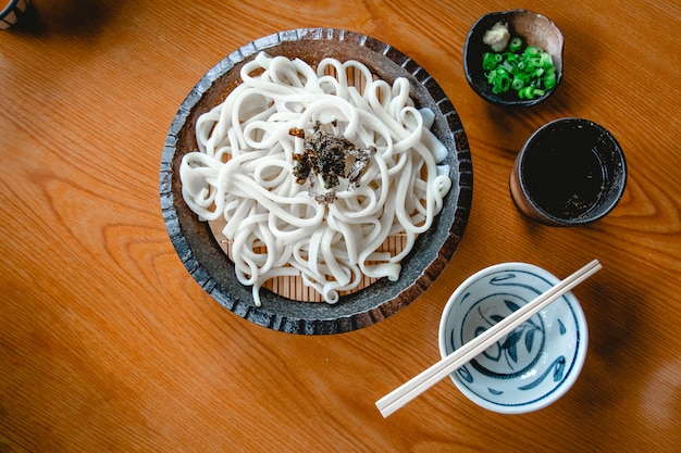 Cold udon with green onion and wasibi.