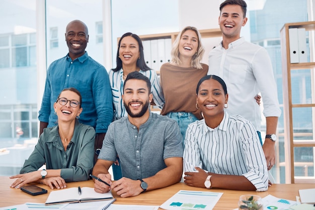 Collaboration meeting and friends with a business team in the boardroom together for strategy or planning Teamwork our vision and laughing with a man and woman employee group sitting at table