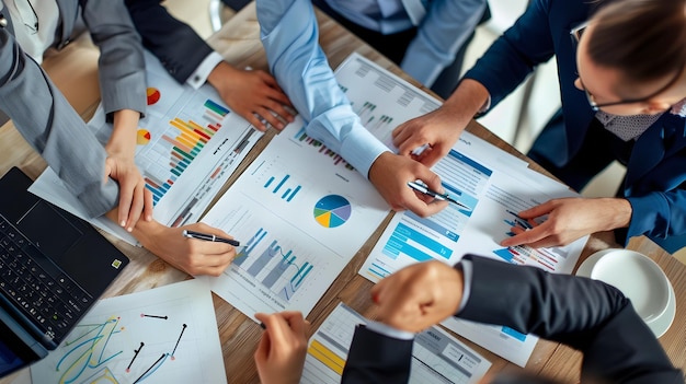 Collaborative Business Professionals Discussing Marketing Strategy on Desk