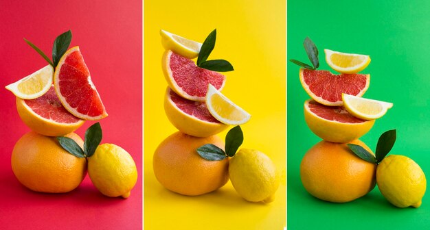 Photo collage of pyramid of grapefruit and lemon in balance on the colored background closeup