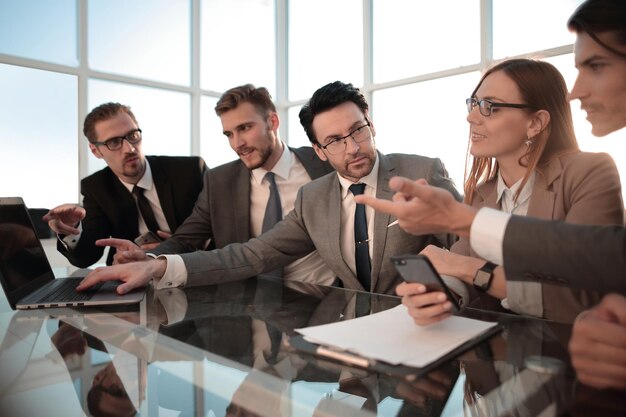 Colleagues in discussion in traders office