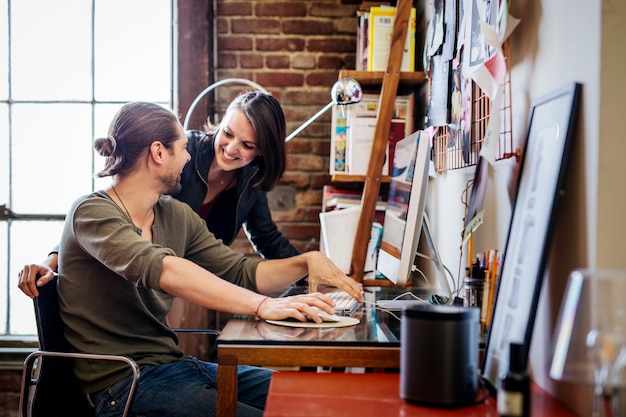 Colleagues working on a project in a home office