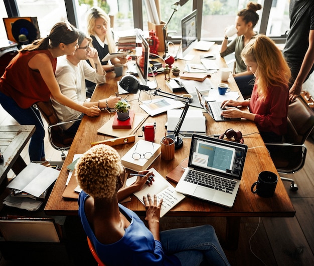 Colleagues working together during the meeting