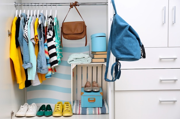 Collection of clothes hanging on a rack