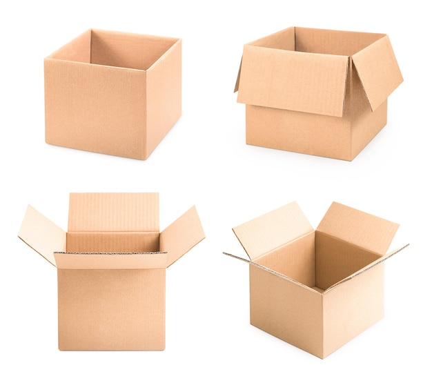 Collection of four open cardboard boxes at different angles on a white isolated background