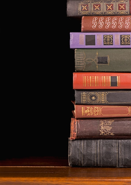 Collection old books against a dark background