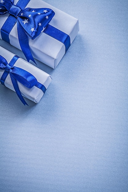 Collection of packed giftboxes on blue background holidays concept