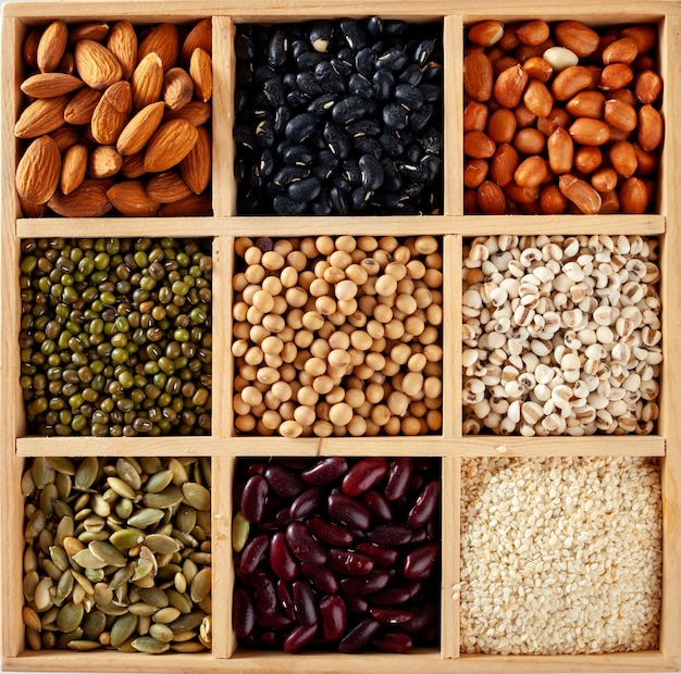 Photo collection series of peas, beans, lentils, peas in a wooden crate.