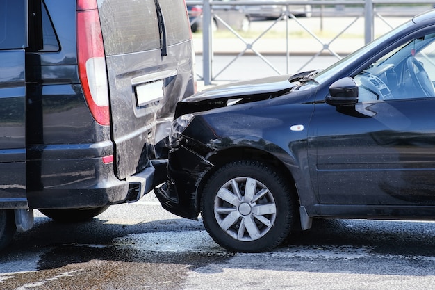 Collision of two cars. Broken bumper and hood.