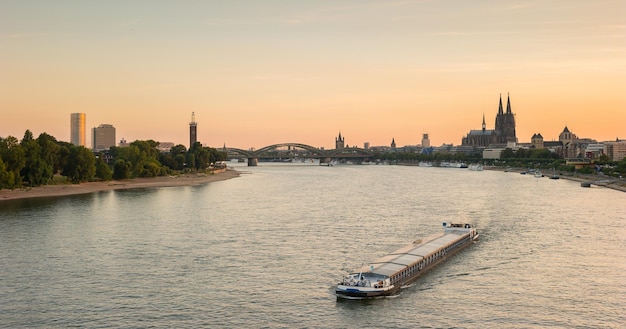 Cologne with Cologne Cathedral and Rhine river during sunset in Cologne