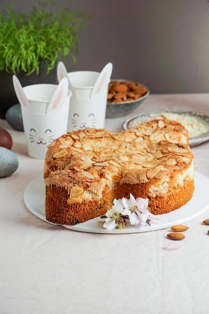 Colomba  traditional italian easter dove cake with glaze macaranage almonds