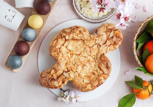 Colomba  traditional italian easter dove cake with glaze macaranage almonds