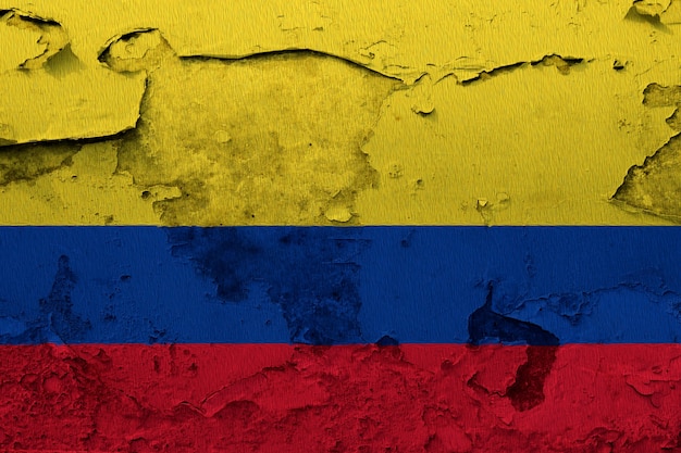 Colombia flag painted on grunge cracked wall