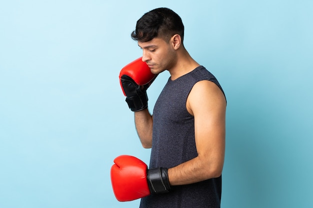 Colombian man isolated with boxing gloves