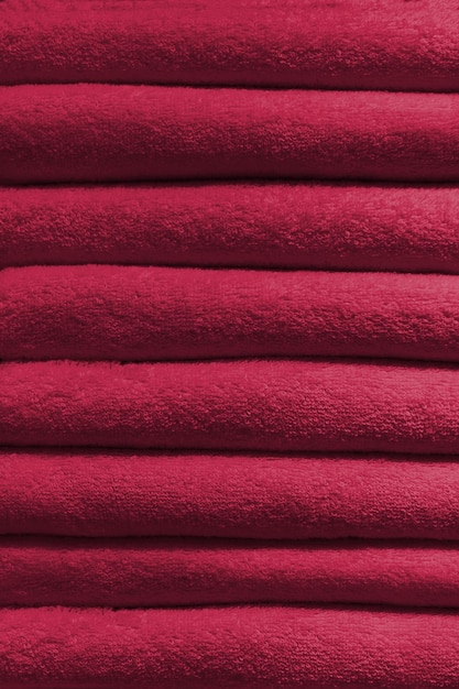 Color Knitting wool texture background. New 2023 trending PANTONE 18-1750 Viva Magenta colour