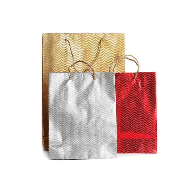 Color paper shopping bags isolated on white Space for design