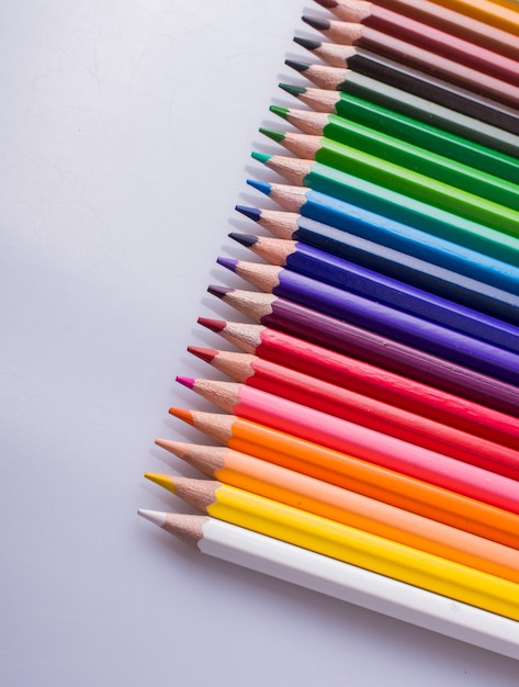 Color Pencils placed on a white background