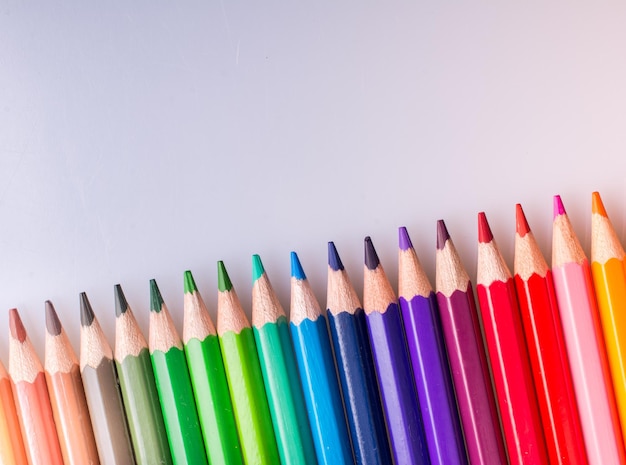 Color Pencils placed on a white background