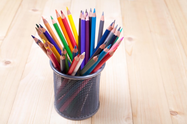 Color pencils on wood table