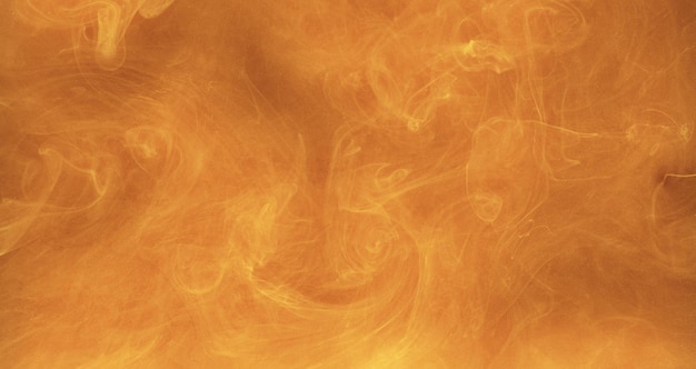 Color smoke cloud ink water texture orange vapor