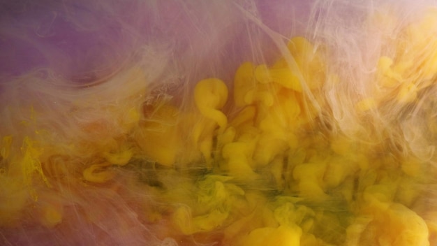 Color smoke splash liquid ink mix yellow purple green cloud haze explosion water paint vapor texture