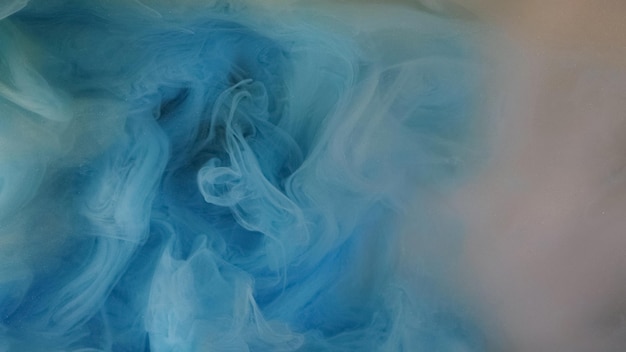 Color smoke texture paint water mix defocused blue mist cloud floating flow dreamlike abstract art