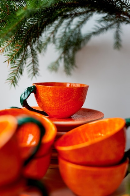 The color of the sun Warmth Bright orange dishes in the style of a Mandarin or orange Ceramics