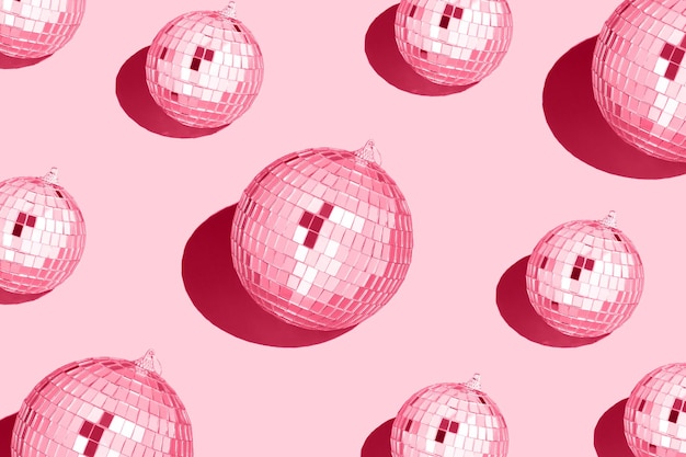 Color of the year 2023 viva magenta Shiny disco balls pattern 90s retro party time concept