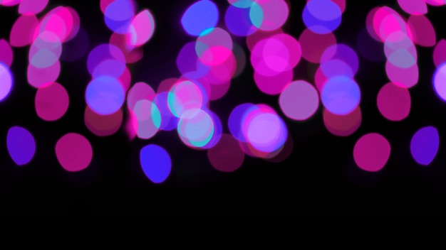 Colored bokeh on a black background. colorful bokeh background