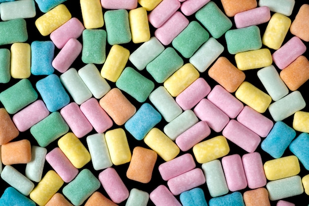 Colored chewing gum background close up