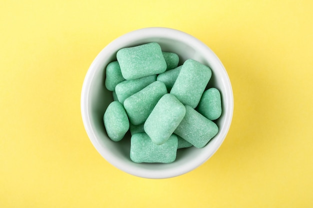 Colored chewing gum in a bowl