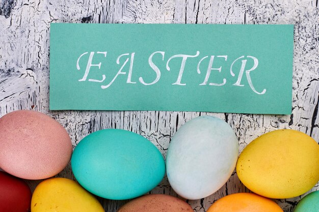 Photo colored easter eggs close up turquoise greeting card