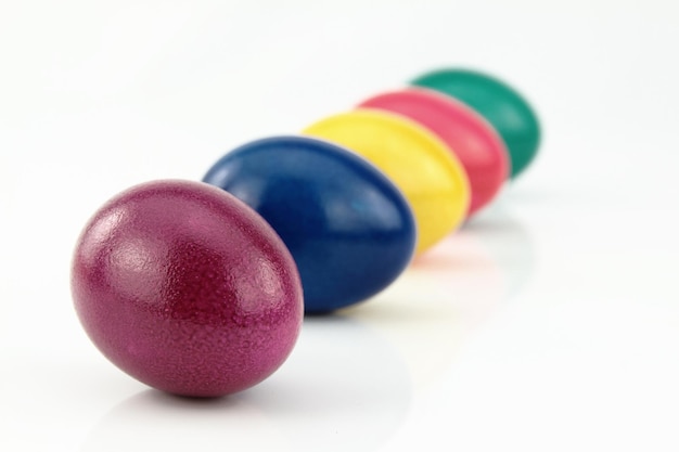 Colored Easter eggs in a row