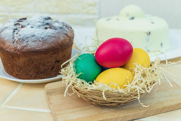 Colored Easter eggs in a wicker basket