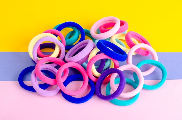 Colored hair ties on bright. 