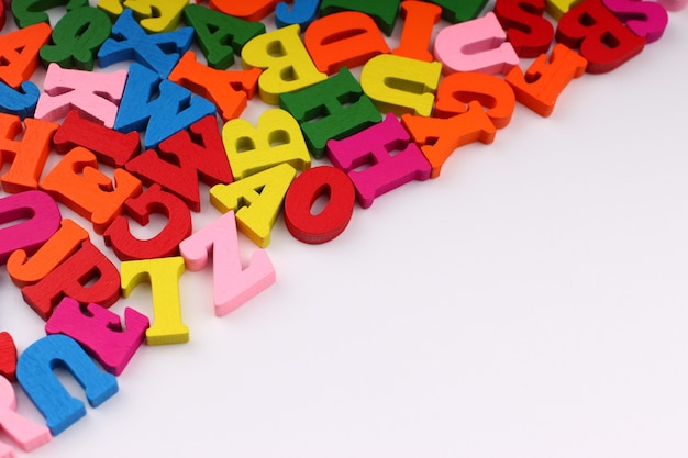 Colored letters close up which symbolize knowledge and learning copy space