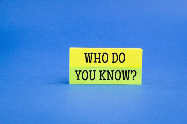 colored paper with the question Who Do You Know?
question concept