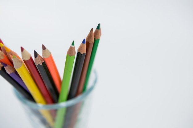 Colored pencils kept in glass