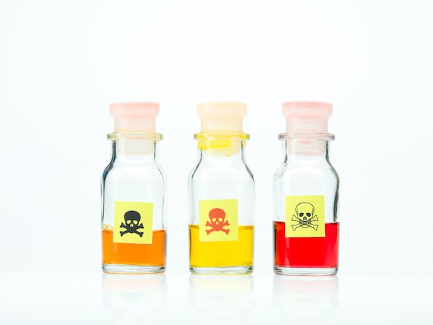 Colored poisonous liquid in three different bottles