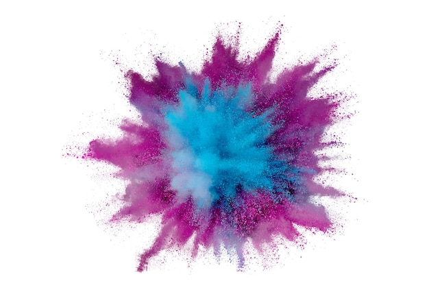 Colored powder explosion. Abstract closeup dust on backdrop. Colorful explode. Paint holi