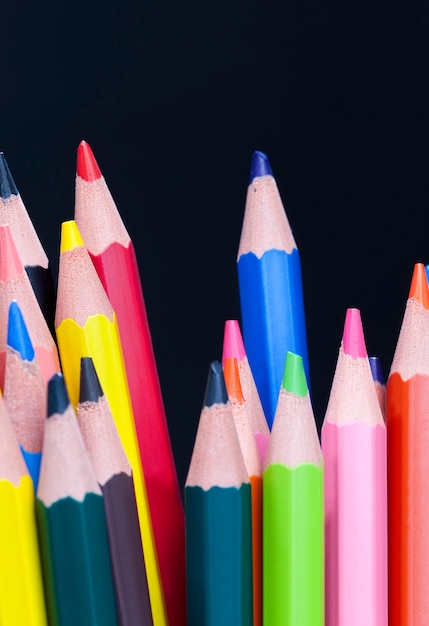 Colored wooden pencils with a different colors