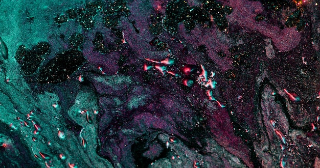 Colorful abstract background marble texture paint blend cyberpunk green purple red glitter grain