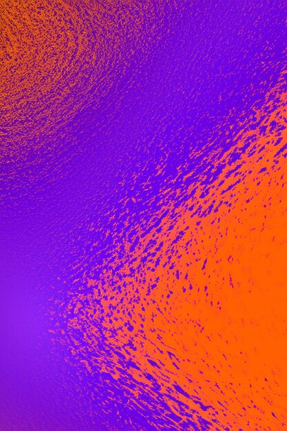 a colorful abstract background of pink and orange colored glass