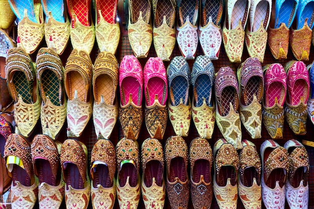 Colorful arabian babouches shoes at market stall