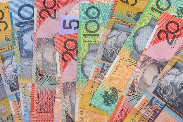 Colorful australian dollar banknotes close up on table