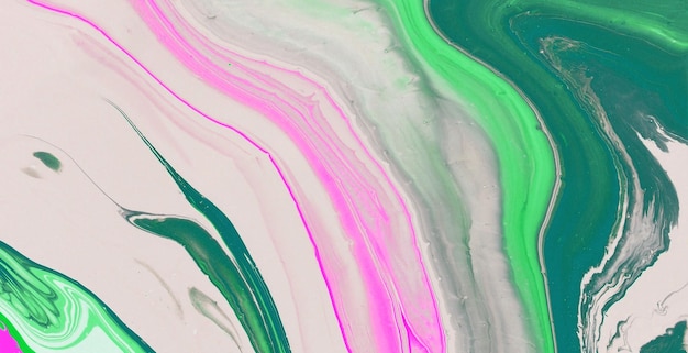 A colorful background with a green and pink paint pattern.