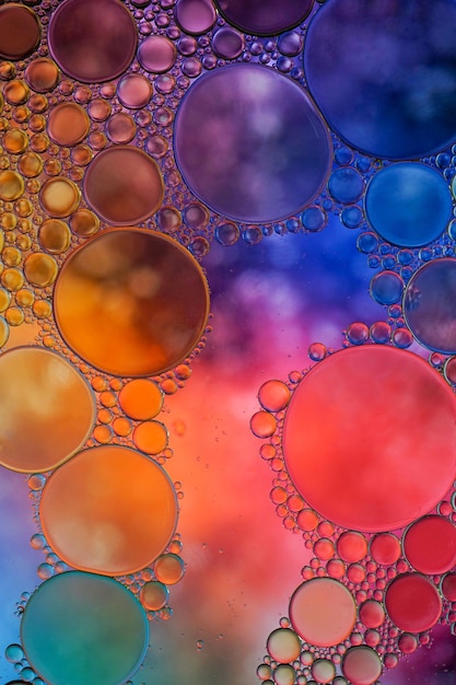 A colorful background with oil bubbles in the middle