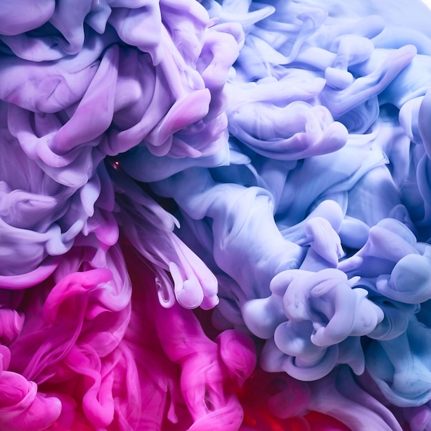 A colorful background with pink and blue paint